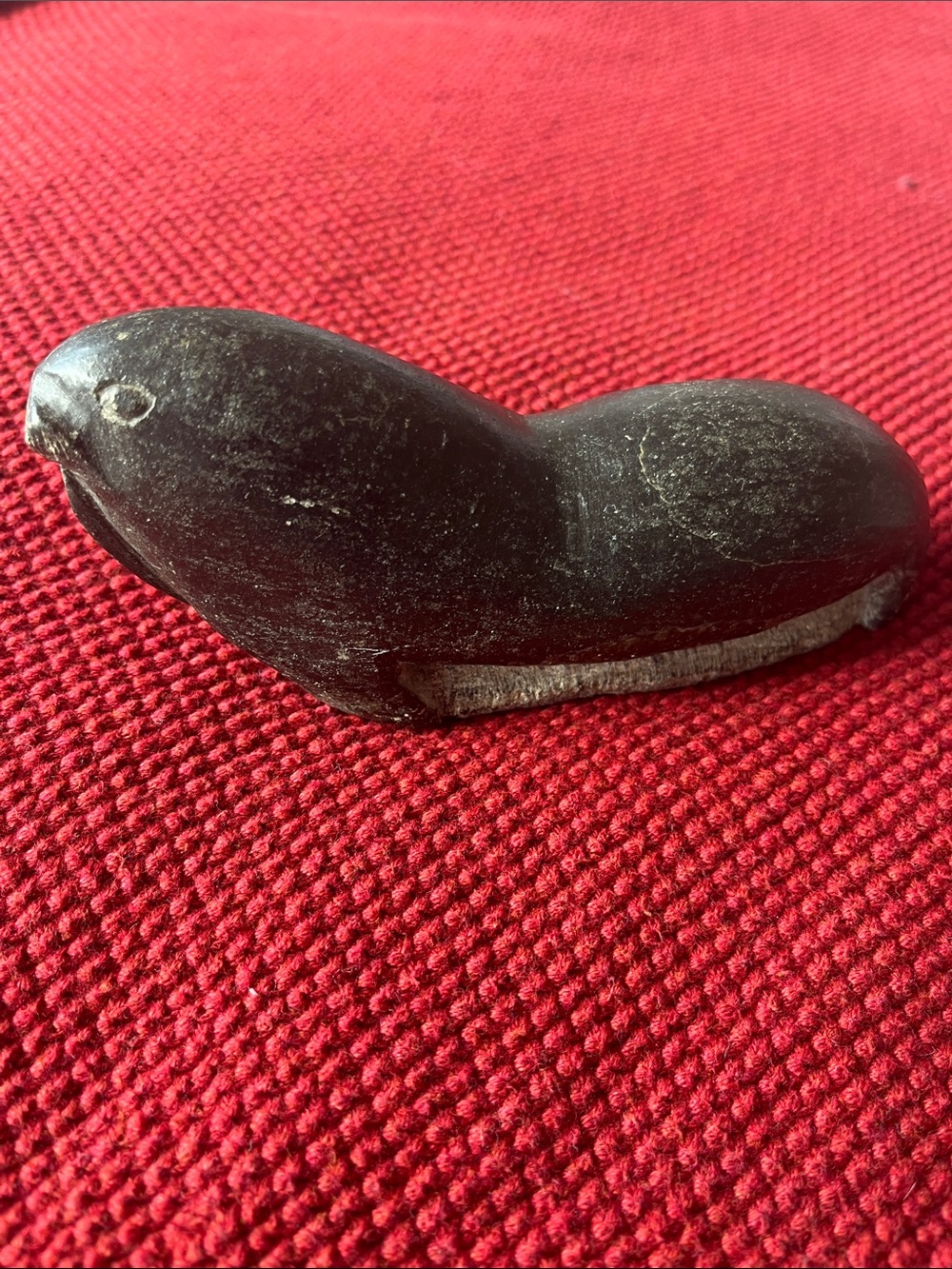 Inuit School Hand Carved Soapstone Figurine of a sea lion 20th century